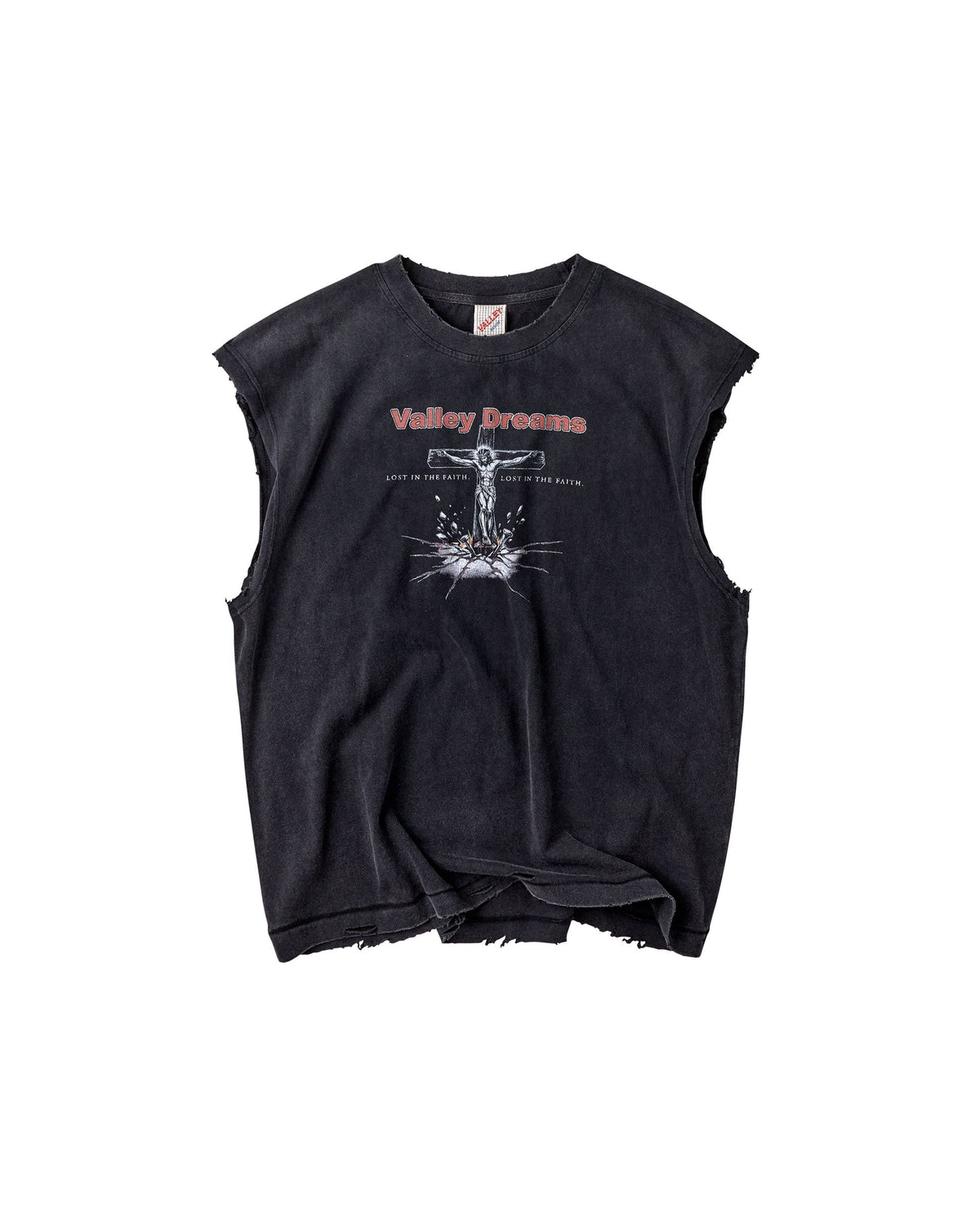 A black acid-washed sleeveless crop top with distressed frayed edges, featuring a white graphic of a crucifix and the text 'Valley Dreams' in red and white on the chest.